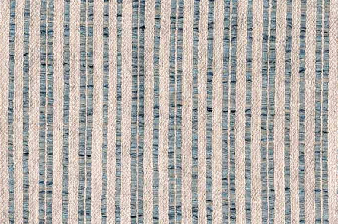 Close-up of textured fabric featuring aqua blue and off-white vertical stripes with uneven, woven patterns creating a tactile appearance.