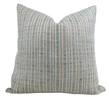 Unravel Pillow Cover in Aqua Blue with woven fabric front and ivory linen back, laid out flat