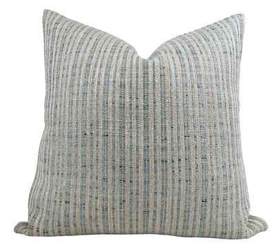 Unravel Pillow Cover in Aqua Blue with woven fabric front and ivory linen back, laid out flat