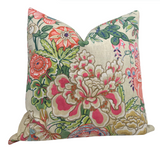 Beige pillow cover featuring Peony Garden floral pattern with ivory linen back, styled on sofa