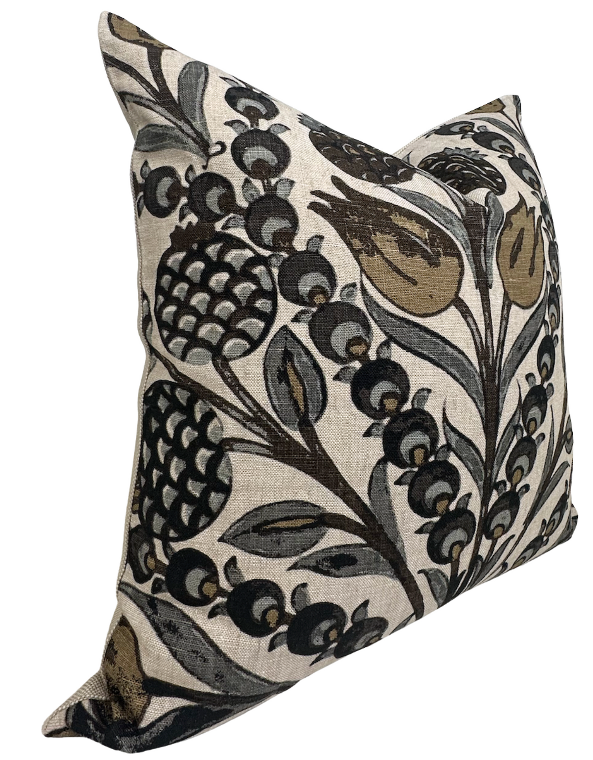 Cornelia Pillow Cover featuring large botanical motifs in muted gold, black, and grey on a beige background, angled to show texture and depth.