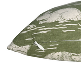 Close-up of sage green pillow cover with textured white cottontail rabbit print and a small white zipper pull on the corner seam