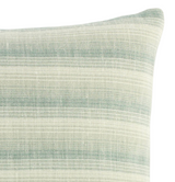 Close-up of a woven pillow cover with horizontal stripes in soft green and off-white tones, featuring a textured, slightly heathered fabric weave.