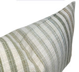 Rectangular pillow cover with horizontal stripes in varying shades of green and cream, displaying textured woven fabric and a sharp corner edge.
