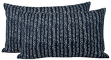 Two rectangular pillow covers in Atlantic Blue with irregular vertical white woven stripes creating a textured, patterned fabric surface.