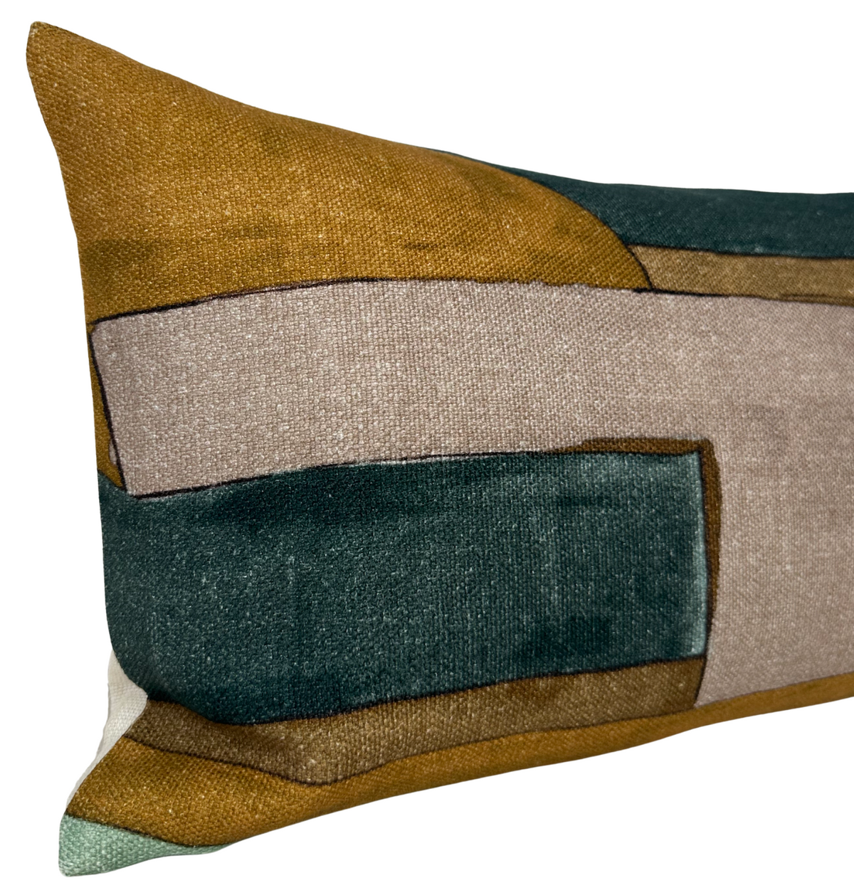 Rectangular pillow with abstract geometric pattern in tobacco brown, tan, teal, and muted green colors, showing textured woven fabric and sharp color contrasts.