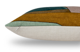 Side view of a rectangular pillow cover with geometric color blocks in mustard, teal, sage green, and beige, showcasing a subtle texture and a zipper on the left edge.