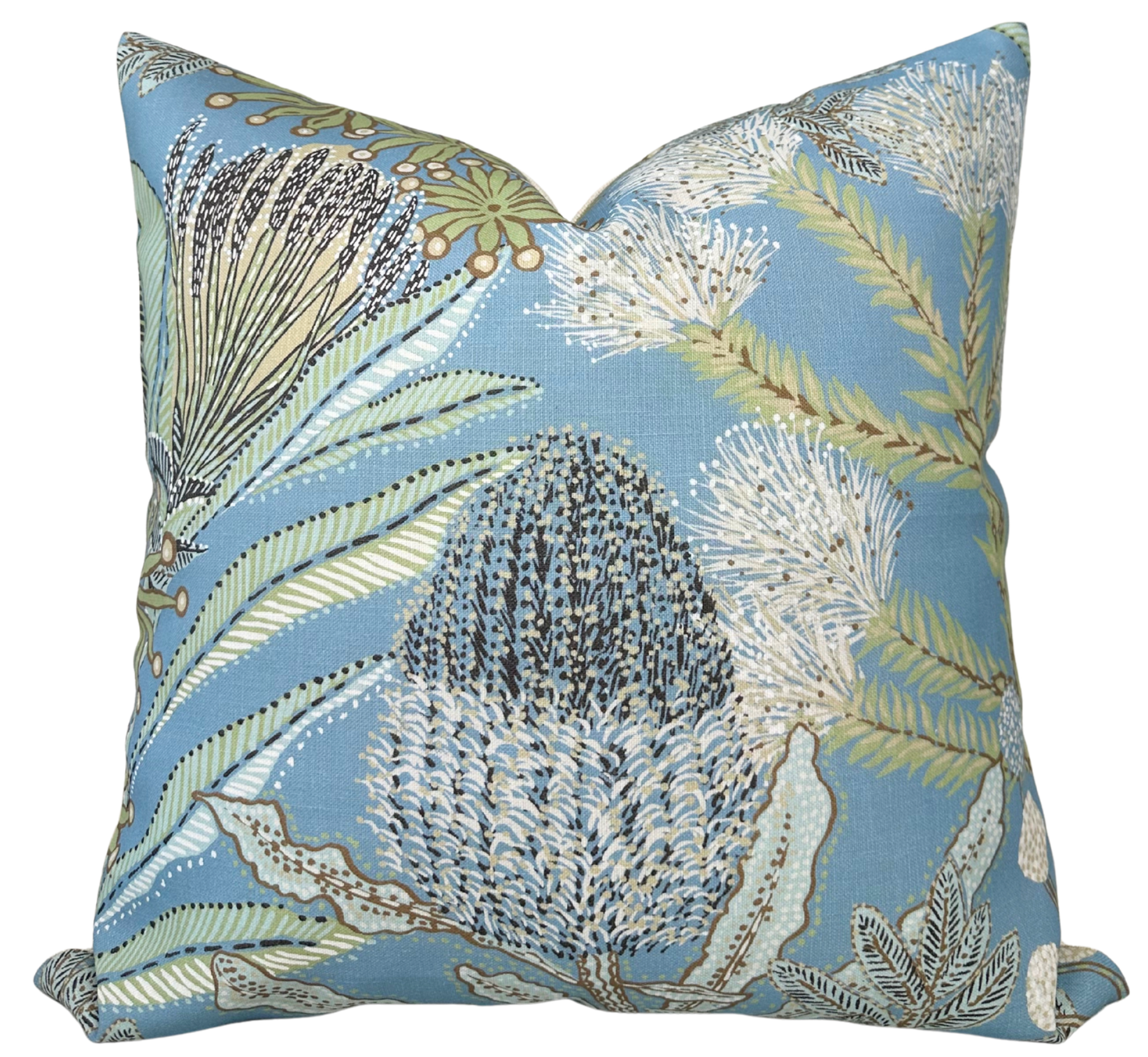 Protea Performance Pillow Cover in Spa Blue displayed on a seating area