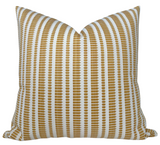 Oyo Pillow Cover in mustard yellow with ivory linen backing, styled on a sofa