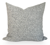 On the Lamb Woven Pillow Cover in Platinum shown in a room setting with close-up fabric texture