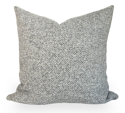 On the Lamb Woven Pillow Cover in Platinum shown in a room setting with close-up fabric texture