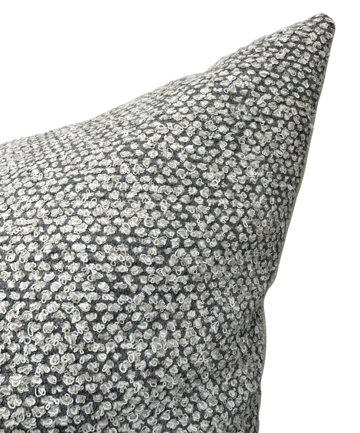 Close-up of the On the Lamb Woven Pillow Cover in Platinum showing dense gray and white looped woven fabric with textured raised dots.