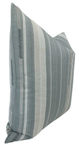Square pillow with vertical grey and off-white stripes and subtle woven geometric accents, shown at an angle against a white background.
