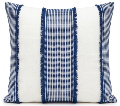 Tulum Casement Embroidered Pillow Cover in Blue resting on a chair with neutral background
