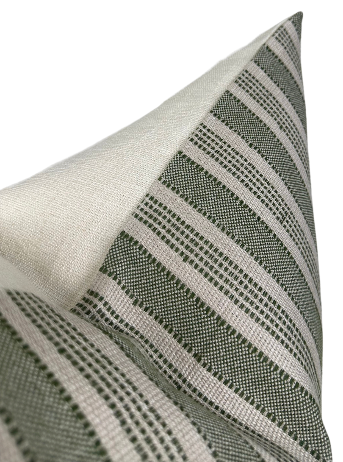 Close-up of a pillow cover showing natural beige fabric with green and beige horizontal stripes featuring a textured woven pattern.
