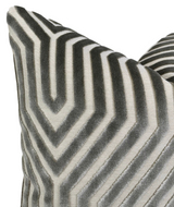 Close-up of a Vanderbilt Pillow Cover in Dove Grey featuring a geometric pattern with raised velvet stripes on a lighter fabric background.