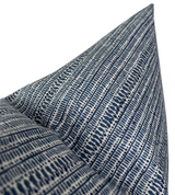 Close-up of Saqqara Pillow Cover featuring tight vertical stripes in varied Atlantic Blue patterns on a white background, highlighting fabric texture and sharp corner.