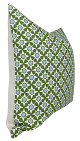Rectangular pillow cover featuring a repeating geometric pattern of green star shapes and light blue flower centers on a white background with plain beige fabric on the side.