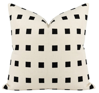 Chalet Embroidered Pillow Cover in Ivory and Black displayed on a neutral sofa