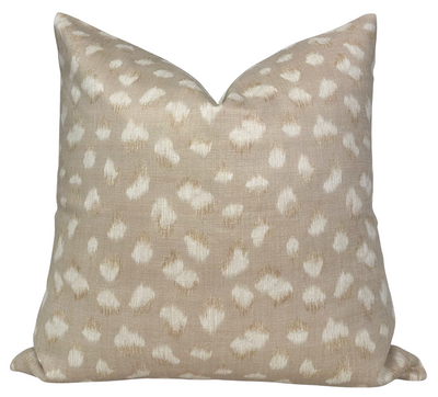 Close-up of the Feline Pillow Cover in beige and ivory showing feline print on front and natural linen fabric on back