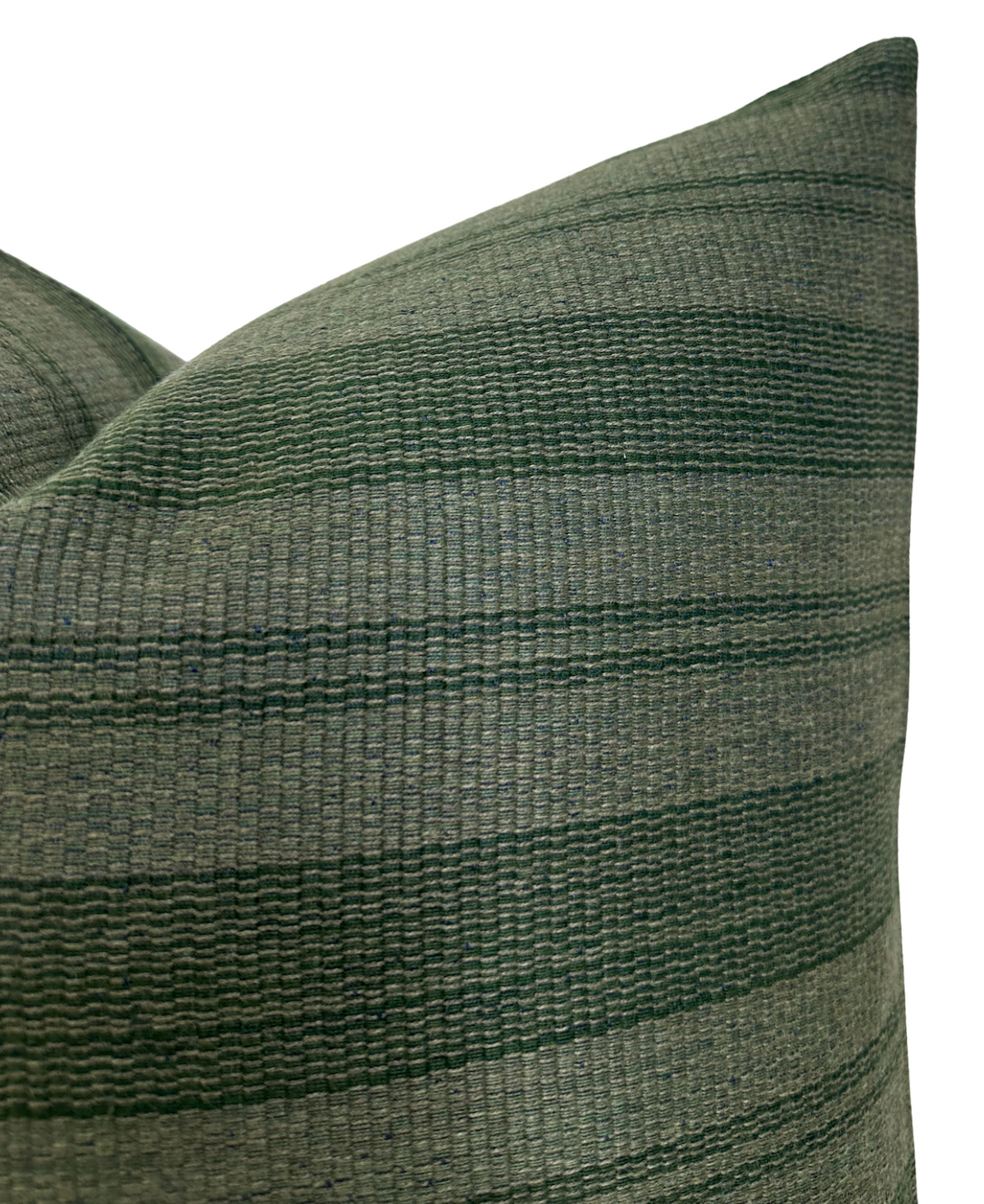 Close-up of a woven pillow cover featuring wide and narrow horizontal stripes in varying shades of forest green with subtle texture variations.