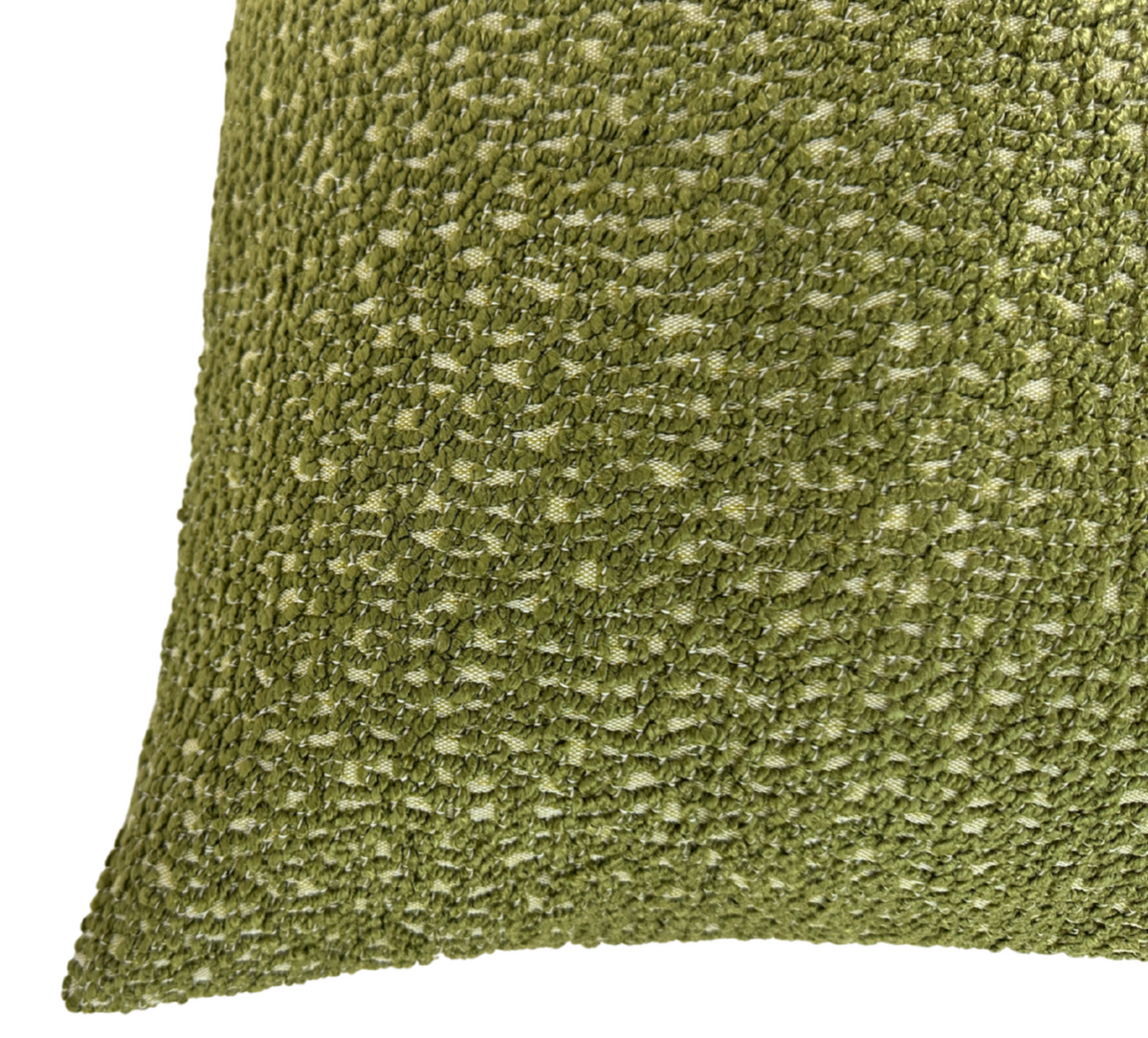Close-up of Serra pillow cover in textured chive green fabric with looped yarn details creating a tactile, intricate pattern.
