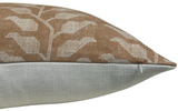 Rectangular pillow with ochre-colored fabric featuring a white leaf pattern on top and plain light gray fabric on the bottom, showing a discreet zipper at the seam.
