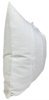 Ivory rectangular pillow cover with textured woven front panel featuring subtle embroidery and fringed edges, smooth solid fabric on the back and sides.