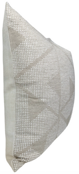 Square pillow cover in natural tones featuring a textured geometric pattern of light beige and cream triangles on woven fabric.