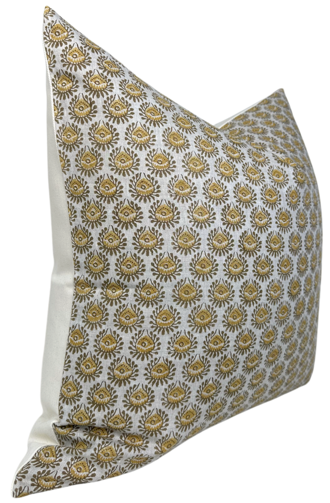 Square pillow cover with repeating saffron-colored eye motif on white background, featuring detailed golden-yellow and gray accents.