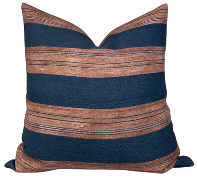 Askew Pillow Cover in Sienna with front showing sienna Askew fabric and back shown in navy linen