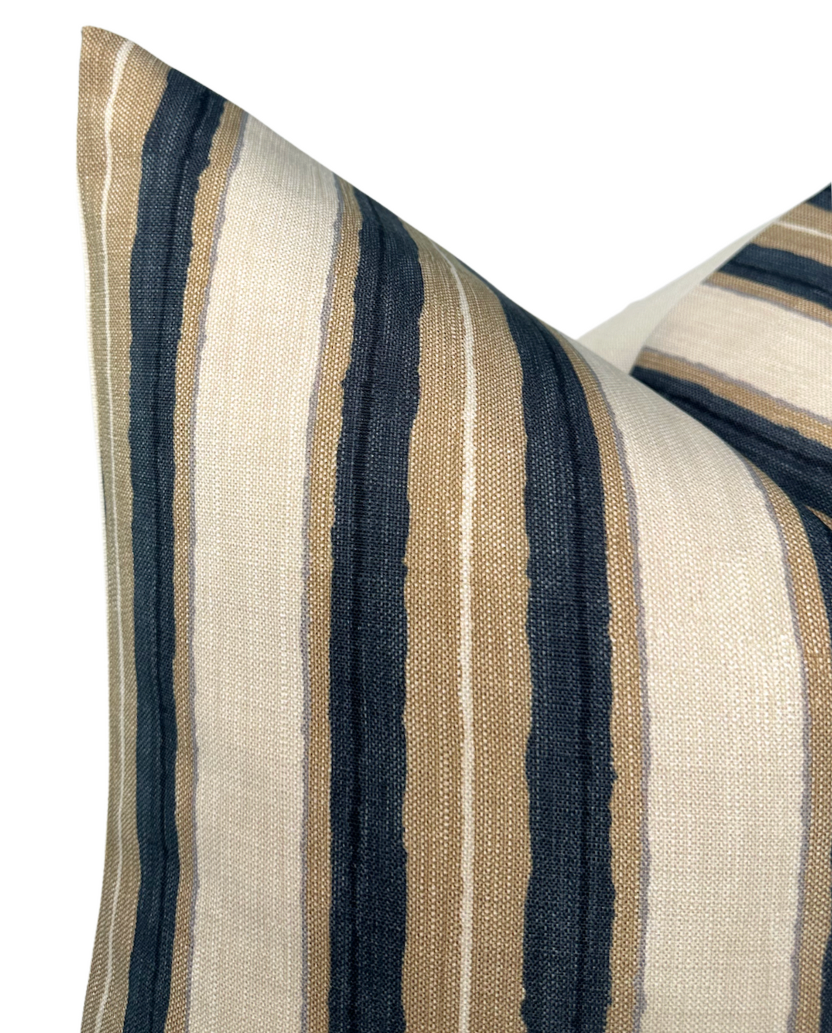 Close-up of Shoreline Pillow Cover in Pebble featuring vertical stripes in navy blue, tan, and beige woven fabric with a textured finish.