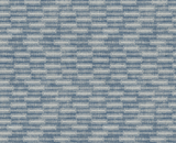 Textured fabric in shades of blue with an irregular brick-like pattern featuring short horizontal strokes in lighter and darker tones.