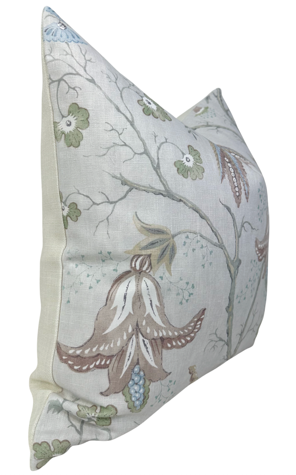 Rectangular pillow cover with muted botanical print featuring large pinkish-brown flowers and smaller blue and green details on light grayish background.