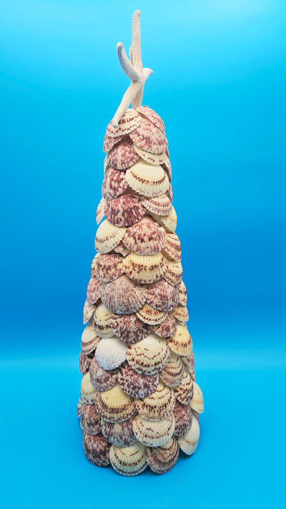 Handmade 18.75 inch scallop shell Christmas tree with natural starfish topper on blue background