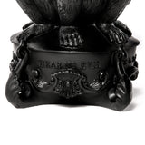 Close-up of black sculpted base with detailed ornate handles and engraved text reading 'HEAR NO EVIL' below three sculpted monkey feet.