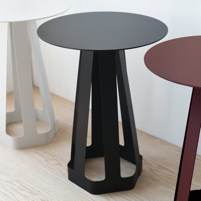 Misewell Sixagon compact side table in Ox Blood color, shown with detail shots and white and black variants