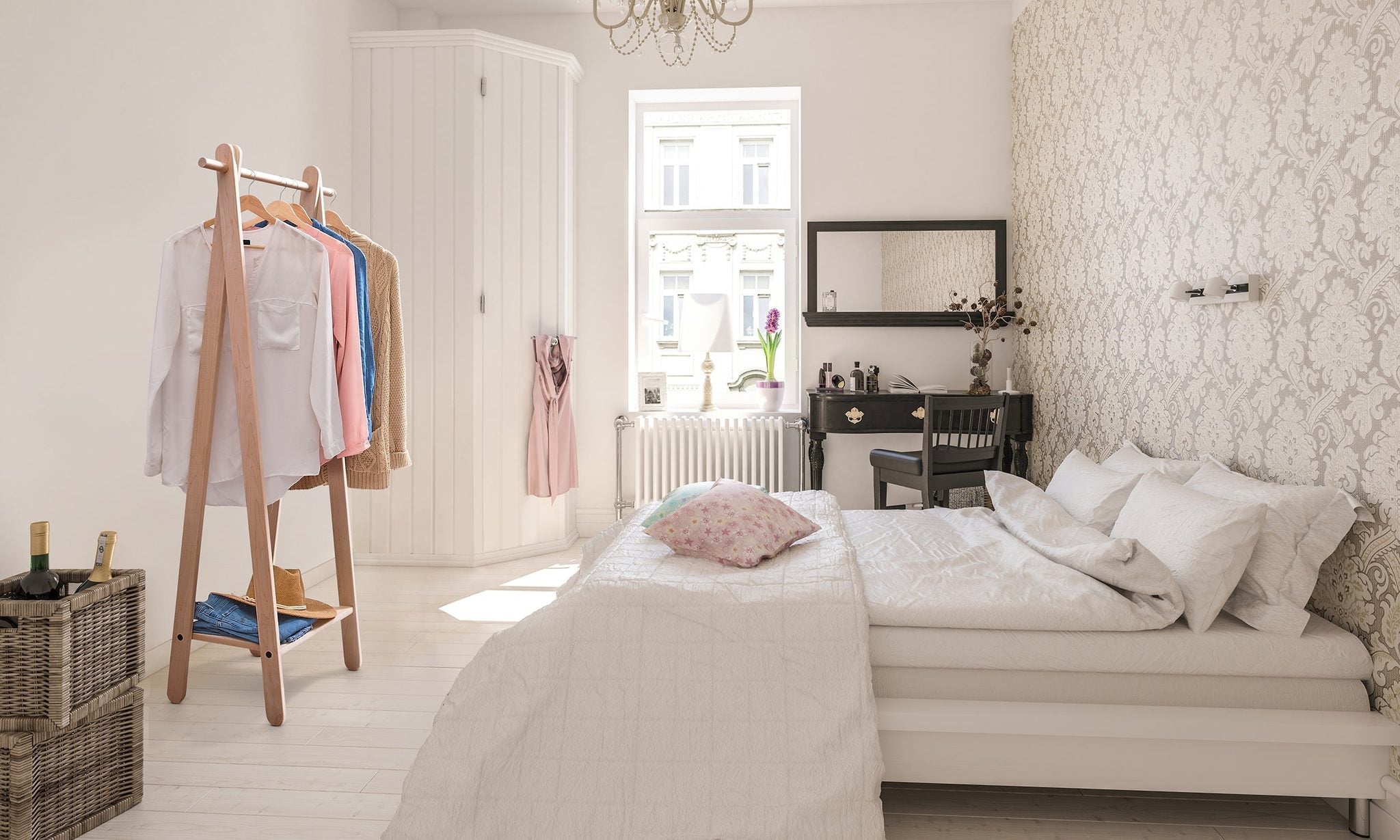 Handcrafted wooden garment rack holding clothes and coats in a home setting
