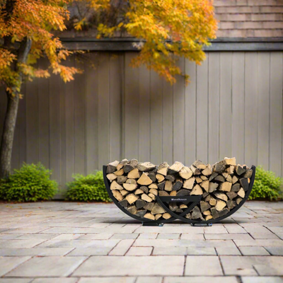 Winter Workman firewood rack by The Woodhaven showing curved steel design and wood storage