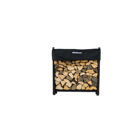 Woodhaven 3 ft Firewood Rack with seasoning cover in black finish holding stacked firewood