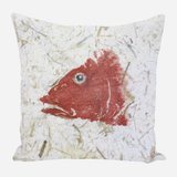 Square pillow with a red fish head illustration against a white background with subtle gray and beige textured streaks.