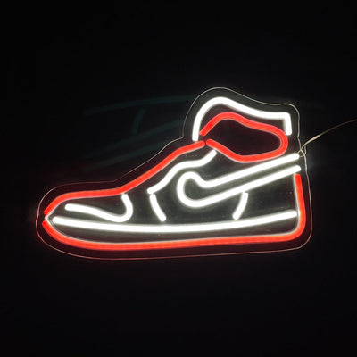 Red Sneaker LED Neon Light showing glowing red sneaker shape on an acrylic backing hanging indoors