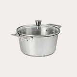 Brushed-finish stainless steel stewpot with rounded glass lid and polished handles from CRISTEL USA’s 1826® collection.