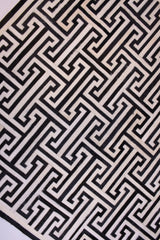 T Model – Maze-Inspired Cowhide Patch Rug by Homelosophy