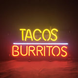 Tacos Burritos Neon Sign glowing bright on metal grid backing