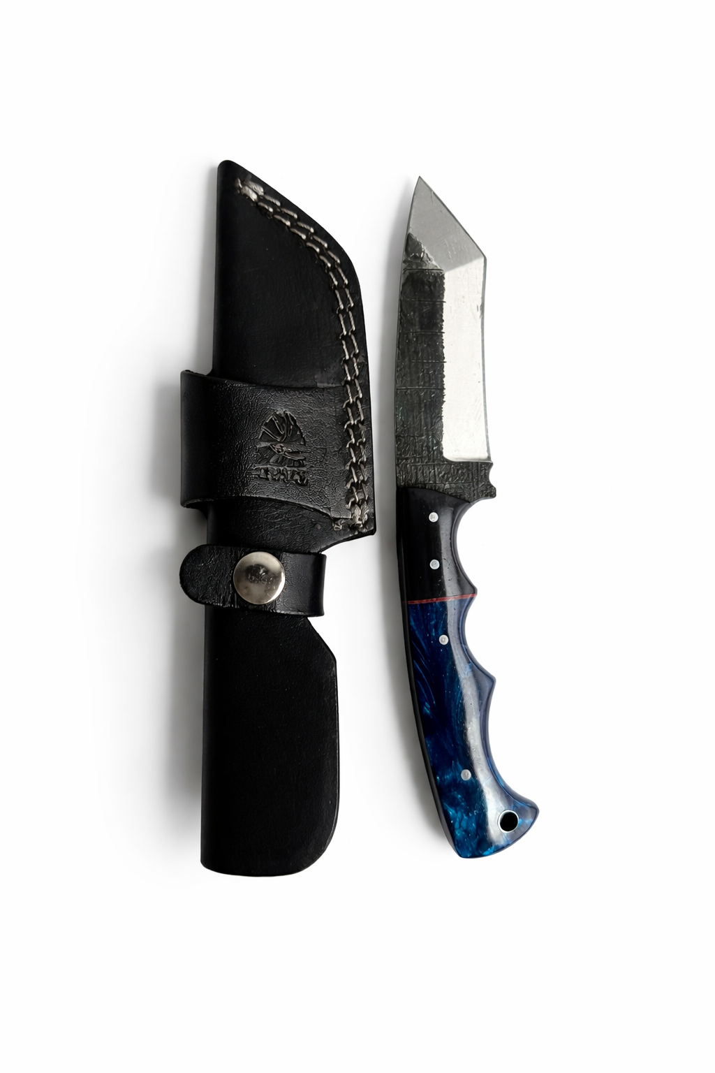 Hand-Forged Carbon Hammered Utility Knife with Resin Handle - TC-600 resting on textured wood background