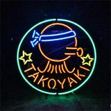 Illuminated Takoyaki Snack Neon Signs Light mounted on metal grid backing glowing warmly indoors