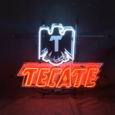 Tecate Lager Beer Neon Light Sign in dark room emitting warm neon glow