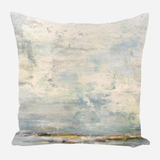 Square pillow with abstract design featuring muted blue, gray, and beige tones resembling a cloudy sky over a distant horizon in soft brushstrokes