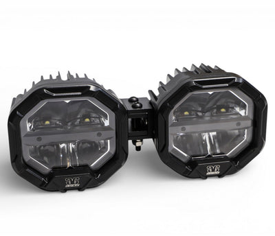 Two interlocked U-Con Off Road LED Pods mounted side-by-side with amber DRL running lights